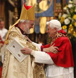 The Archbishop of Canterbury, Dr Rowan Williams, embraces Pope Benedict at Westminster Abbey