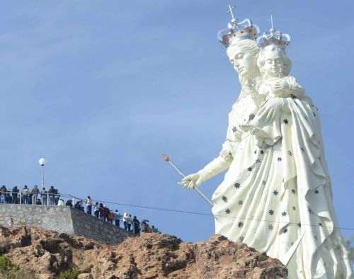 A newly unveiled statue of the Virgin Mary holding a baby Jesus on Santa Barbara hill in the mining city of Oruro, Bolivia. The 45 meter (147 feet) statue that took four years to build, known in Spanish as "Virgen del Socavn," or the Virgin of the Tunnel, is Oruro's patron, venerated in particular by miners and folkloric Carnival dancers.