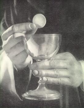 The host is presented to believers during sacred communion, and is the body of Christ.