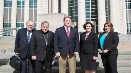 Archbishop Robert Carlson with (from left) Thomas More Society president Tom Brejcha, business owner Frank O'Brien, Thomas More Special Counsel Sarah Pitlyk, and Peggy Forrest, executive director of Our Lady's Inn. 