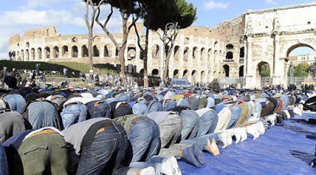 Muslims pray at the Colosseum in Rome