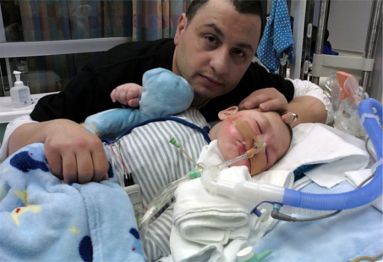 Moe Maraachli with his son Joseph. Joseph's life support is scheduled to be removed on Monday, against his parents' wishes.