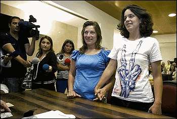 Teresa Pires and Helena Paixao, divorced Portuguese mothers, become Portugal's first gay couple.