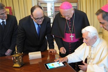 Pope Benedict XVI sending his first tweet.