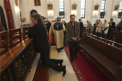 In this photo taken Saturday, Dec. 25, 2010, Christians attend the Christmas mass at the St. Grigor Armenian Catholic church in Tehran, Iran. Iran has arrested about 70 Christians since Christmas in a crackdown that demonstrates the limits of religious tolerance by Islamic leaders who often boast they provide room for other faiths.