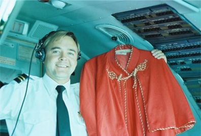 Nelson Krueger, Pope John Paul II's Methodist Pilot, dries the Pope's cape in the cockpit air vent