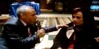 Sheikh Awn telling his concubine-bride what to say during their "nuptial vows," which included her "enslavement" to the self-proclaimed Sharia expert.