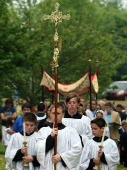 Prince of Peace parishioners process with the Blessed Sacrament for the Feast of Corpus Christi 2013. More than 400 parishioners took part in the procession.