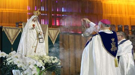 Archbishop Salvatore Cordileone censes a statue of Our Lady of Fatima at St. Mary’s Cathedral on Oct. 7.