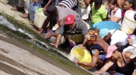 Venezuelans Collect Drinking Water �FROM THE SEWER!