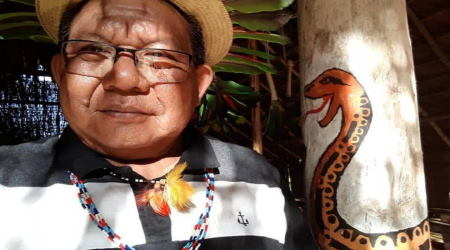 Fr. Justino Sarmento Rezende enjoys portraying himself with indigenous gear and markings on his Facebook page.