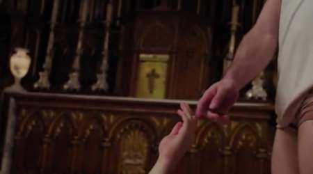 Hands of two homosexual men touch, mocking Michelangelo’s famous Sistine Chapel depiction of the Creation of Man