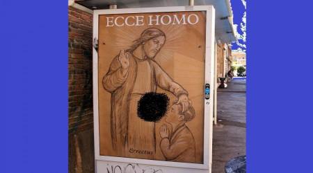 The blasphemous image, which appeared outside Rome's Museum of Modern Art.
