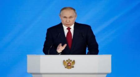 Putin karatechopping the podium
