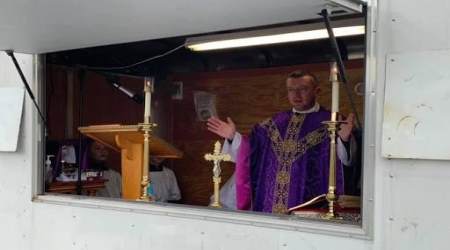 Fr. Whittington and his drive-in congregation