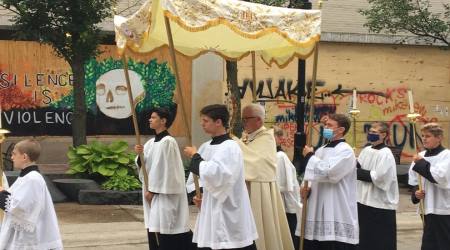Bishop Donald Hying, Diocese of Madison, Wisconsin, leads a Eucharistic procession in Madison Aug. 15, 2020. 