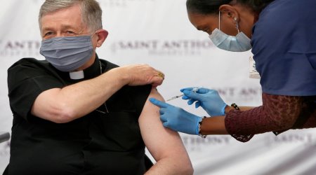 Cardinal Cupich receives abortion-rainted COVID-19 vaccine