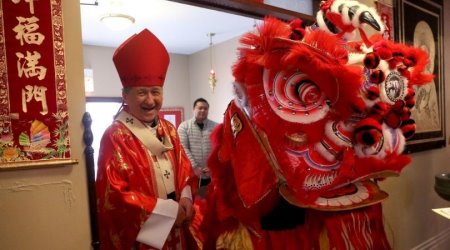 Cupich with a pagain lion
