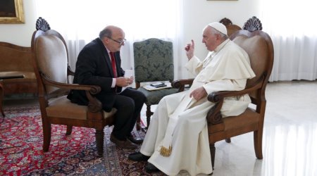 Francis and reporter Philip Pullella