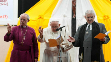 Pope Francis, Archbishop of Canterbury Justin Welby and Iain Greenshields give a joint blessing in South Sudan, on February 4, 2023.