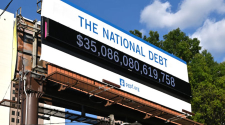 billboard listing the US national debt
