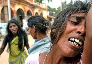 A day after her 9-year-old daughter Nirmala was washed out to sea by a tsunami wave, Thenmozhi, 26, wandered dazed through the southern India coastal town of Cuddalore wailing over and over, Oh, what sin did I commit? Why did the Almighty take my daughter away?