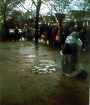 Veronica prays near spring location